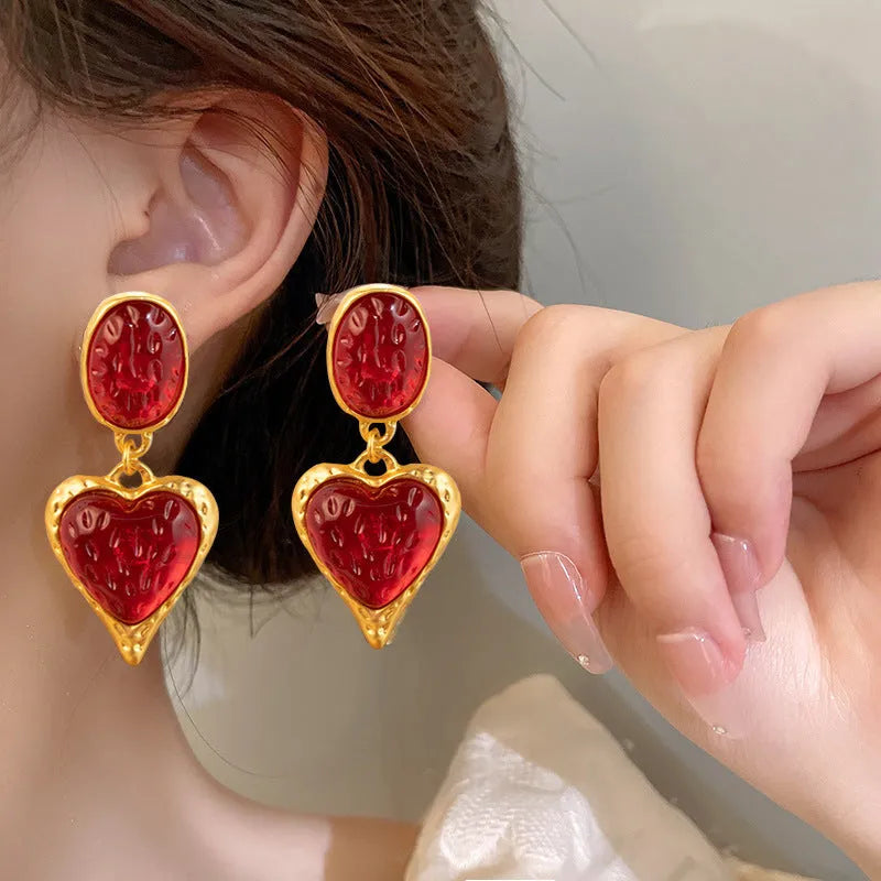 Silver needle pleated oval love heart alloy stud earrings in purple, red, green, and yellow-white.