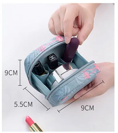 Cloth makeup storage bag with a cube shape and plain pattern, shown in blue colour.