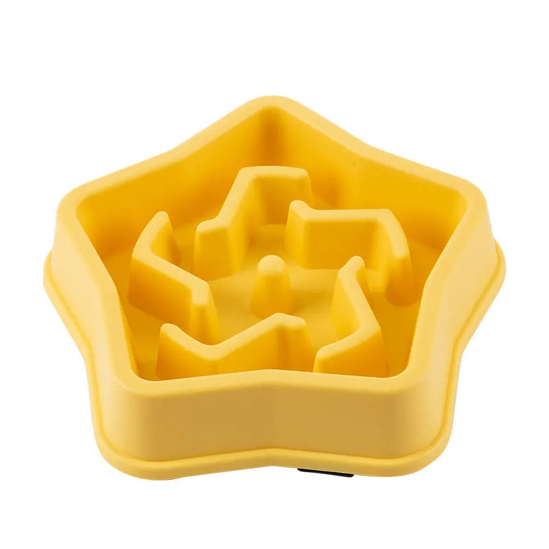 Yellow plastic dog slow feeding bowl with rough bottom pattern, 20.1cm diameter, isolated on white background