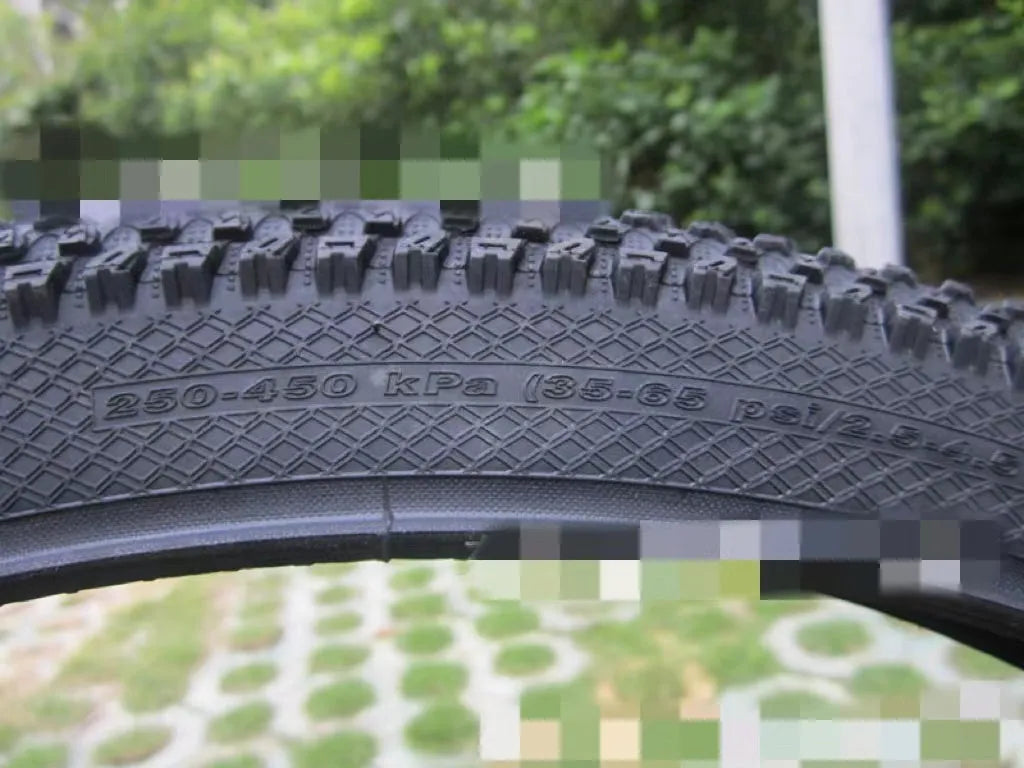 Ultralight mountain bike puncture proof tyre showing tread and available in multiple wheel sizes