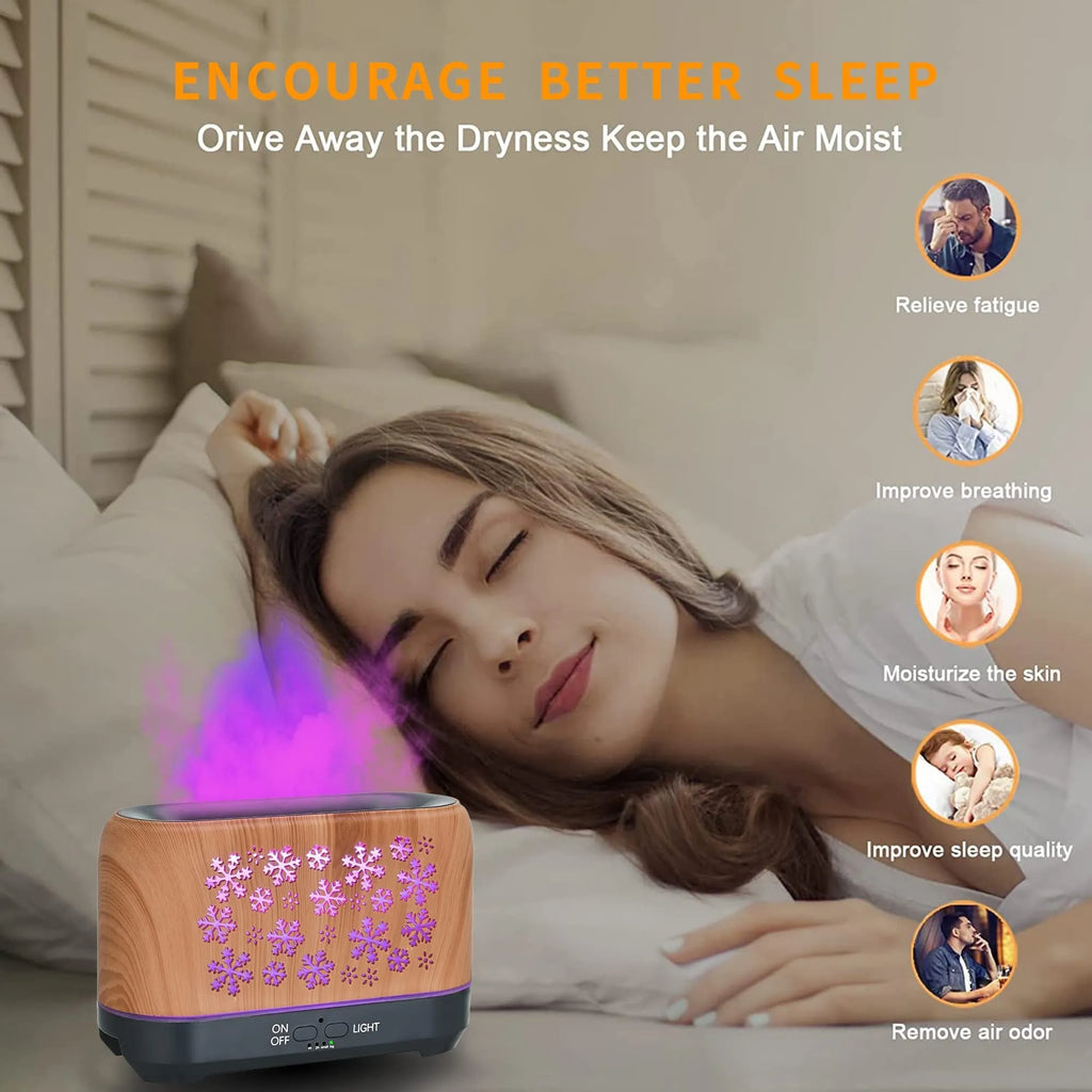 Wood grain snowflake pattern humidifier with colourful flame mist effect on desktop