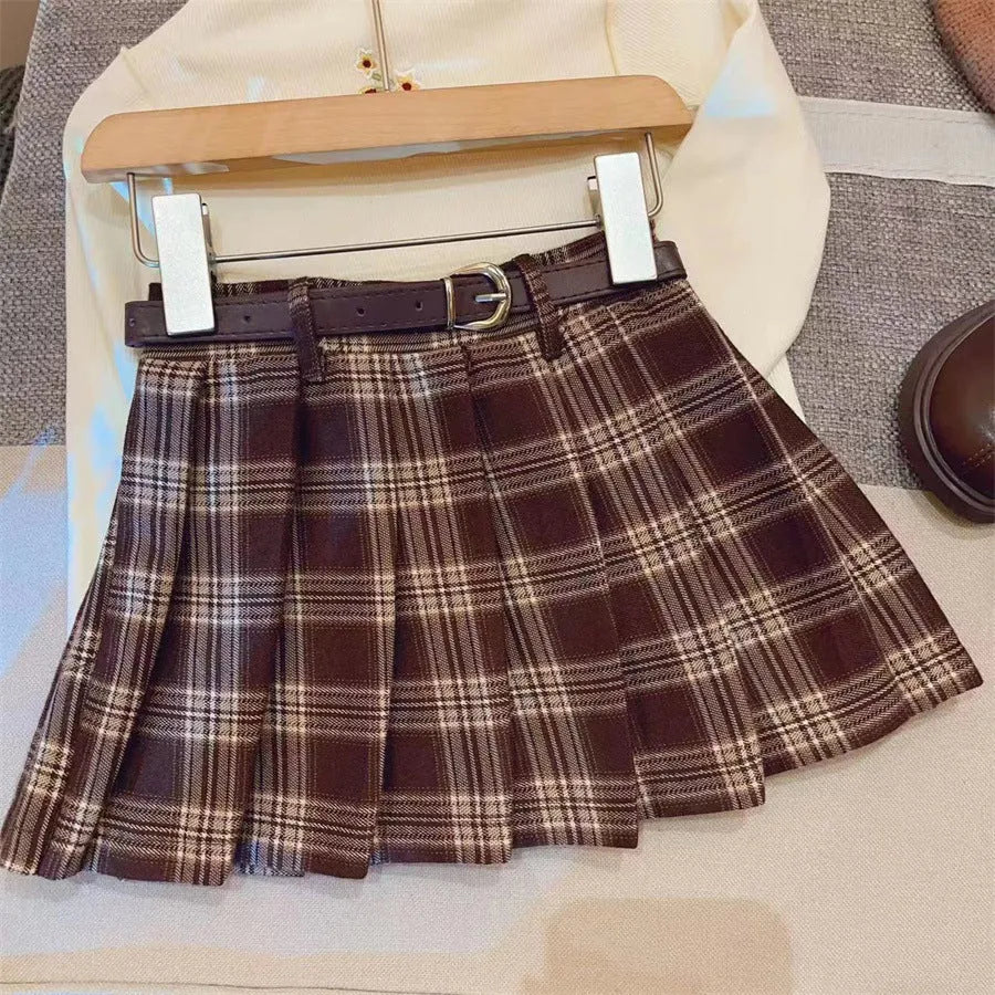 Girls' plaid pleated skirt in cotton blend fabric shown in A-line style for casual wear