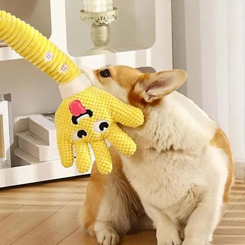 Yellow palm-shaped plush dog teething toy with squeaker for puppies