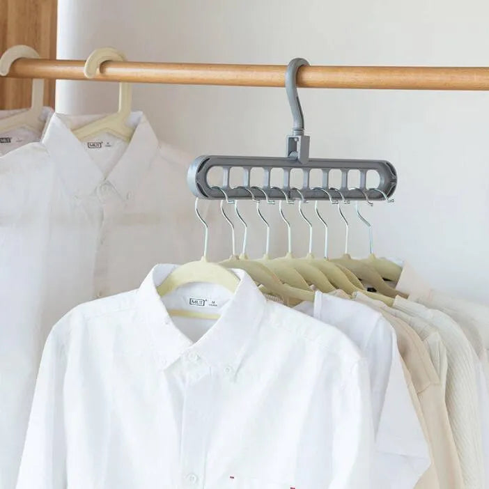 Plastic clothes hanger with 360 degree rotating hook, 33 cm long, available in pink, green, beige, grey, white, and grey
