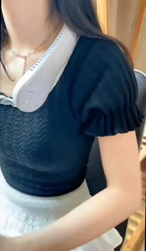 Pink USB rechargeable bladeless neck fan worn around neck, showing flexible band and air vents.