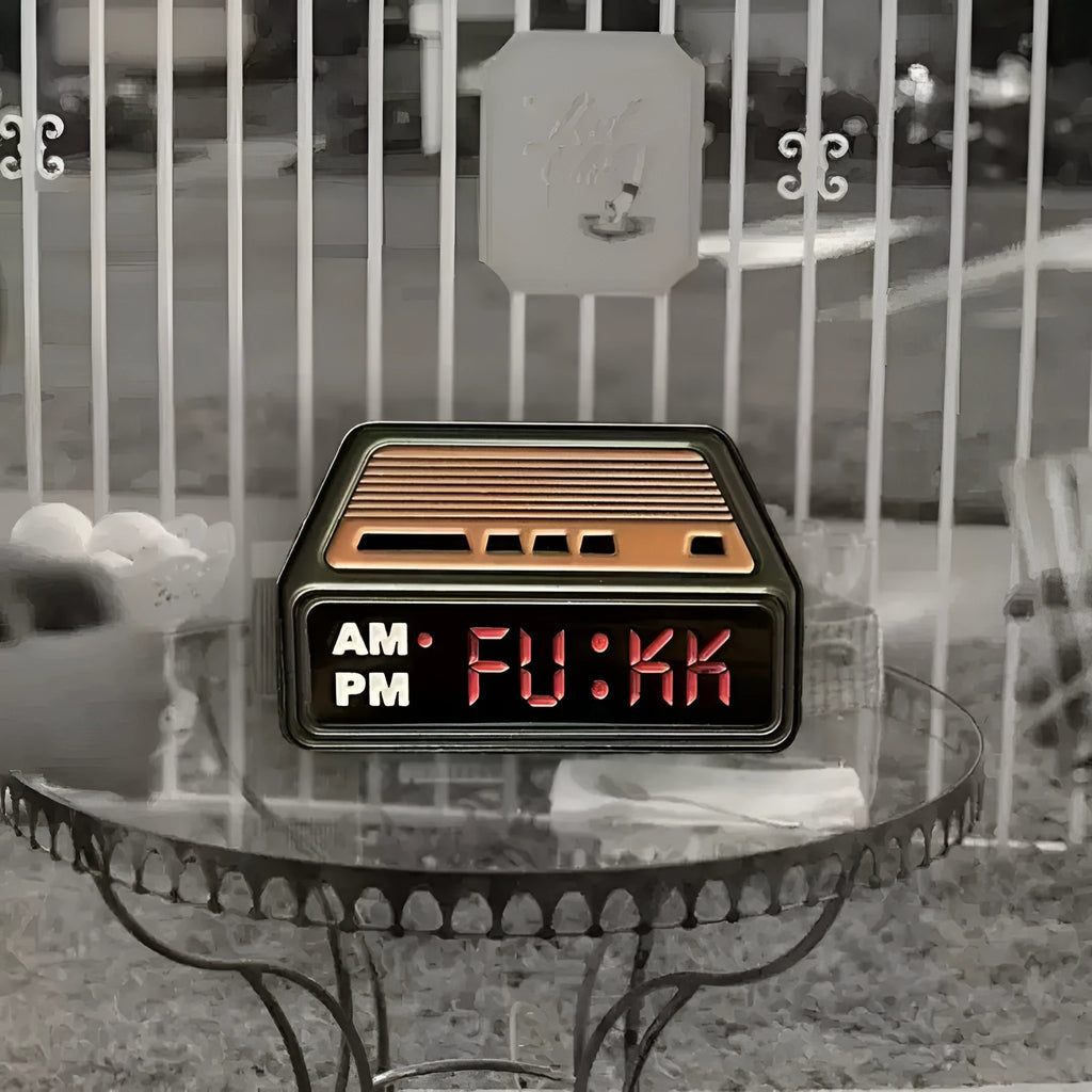 Creative Home black metal retro alarm clock brooch pin with original design on a jacket lapel