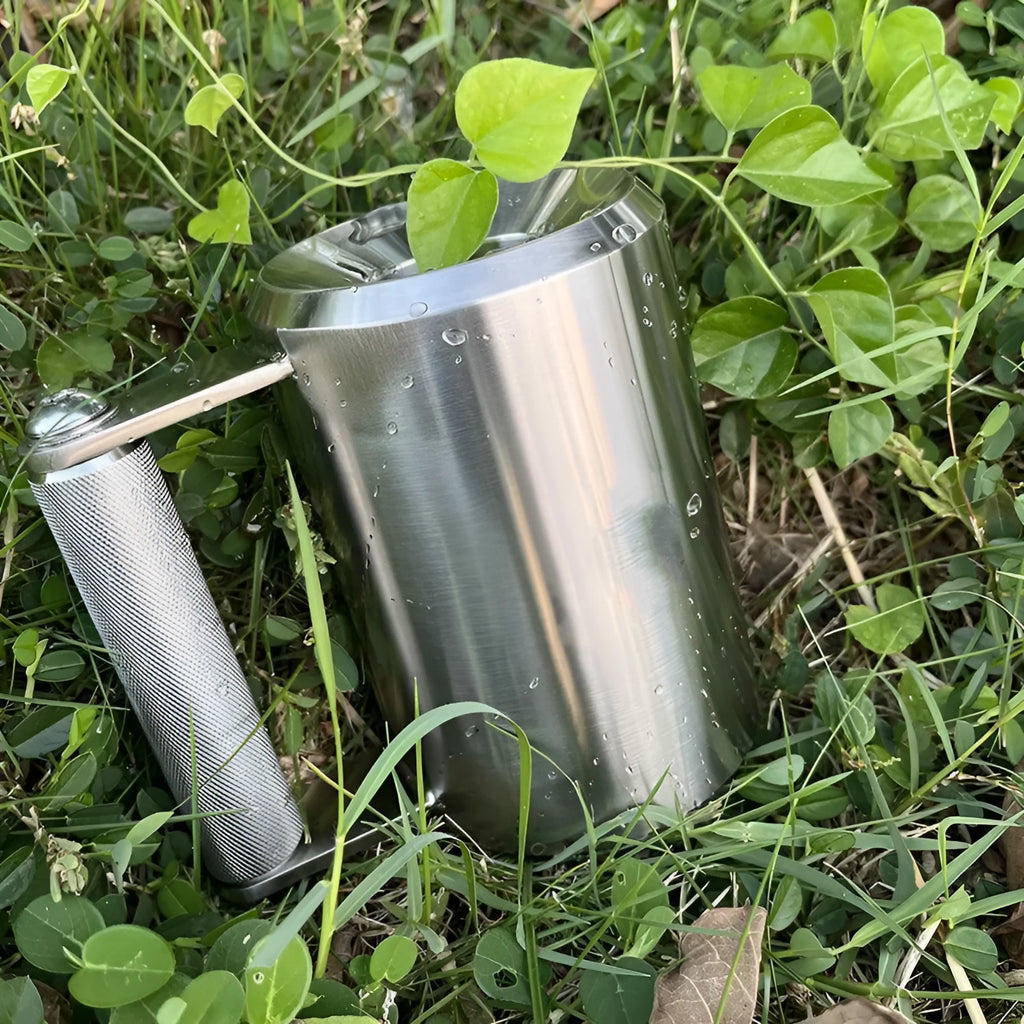 Silver stainless steel dumbbell overweight cup weighing 8kg on a cast iron base.