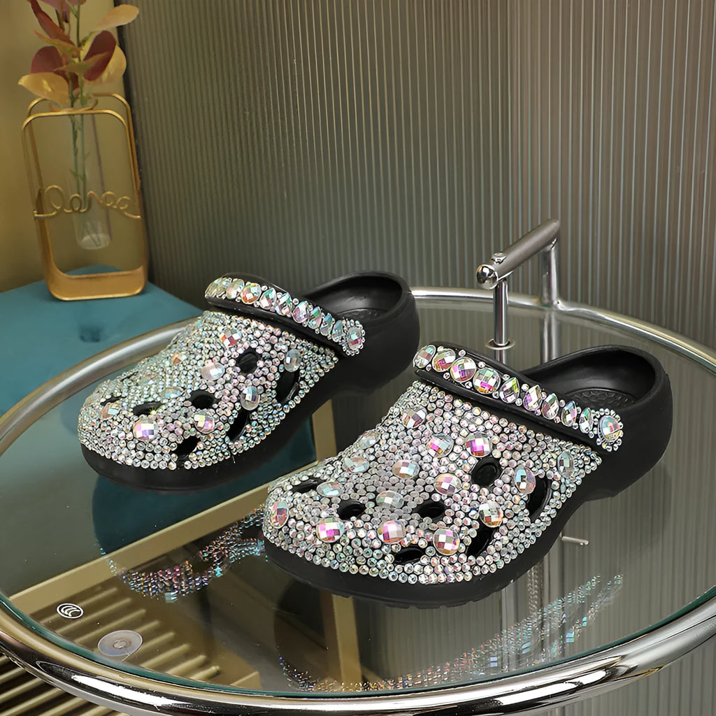Black women's platform casual sandals with rhinestone detail on an EVA upper and sole.