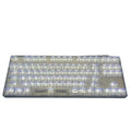 132 transparent plastic key caps for mechanical keyboard customisation arranged in full keyboard layout