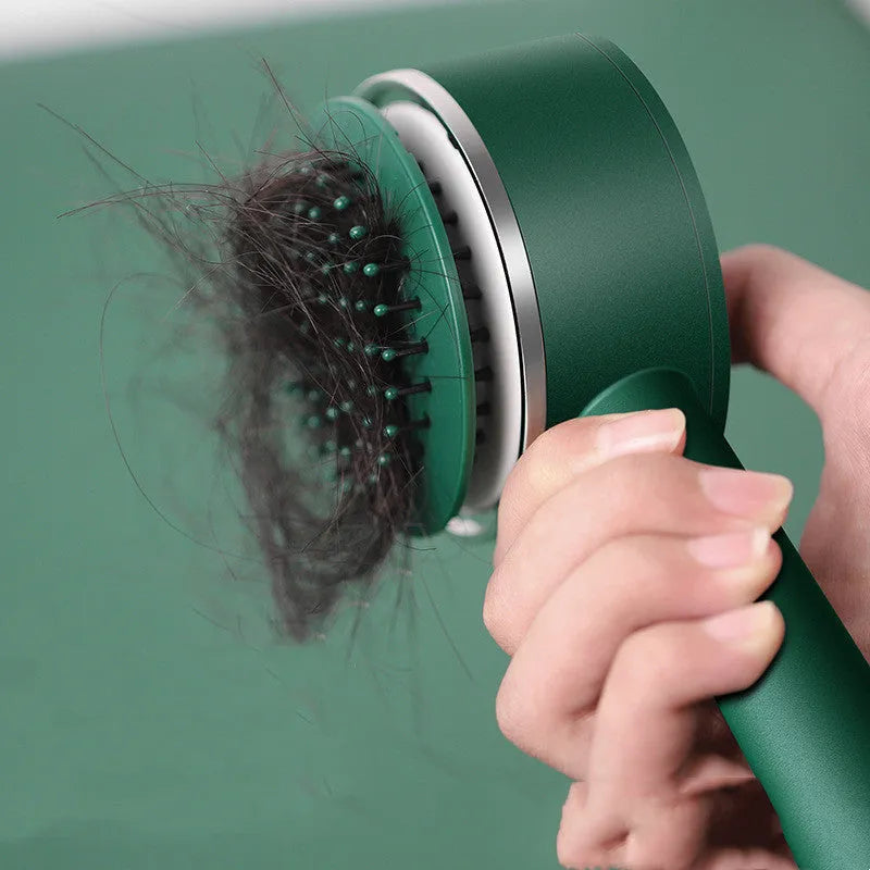 Plastic air cushion hairbrush with long handle in green, white, and pink, 10-15cm