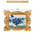 DIY oil painting kit box showing acrylic paints, brushes, and an epoxy pottery panel printed with Van Gogh's Sunflowers artwork.