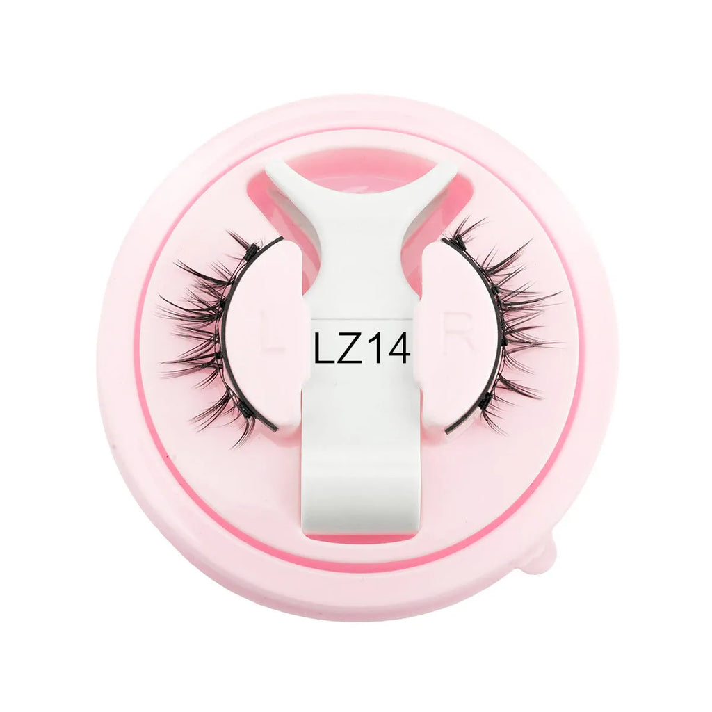Set of reusable waterproof false eyelashes in five styles on a clear tray