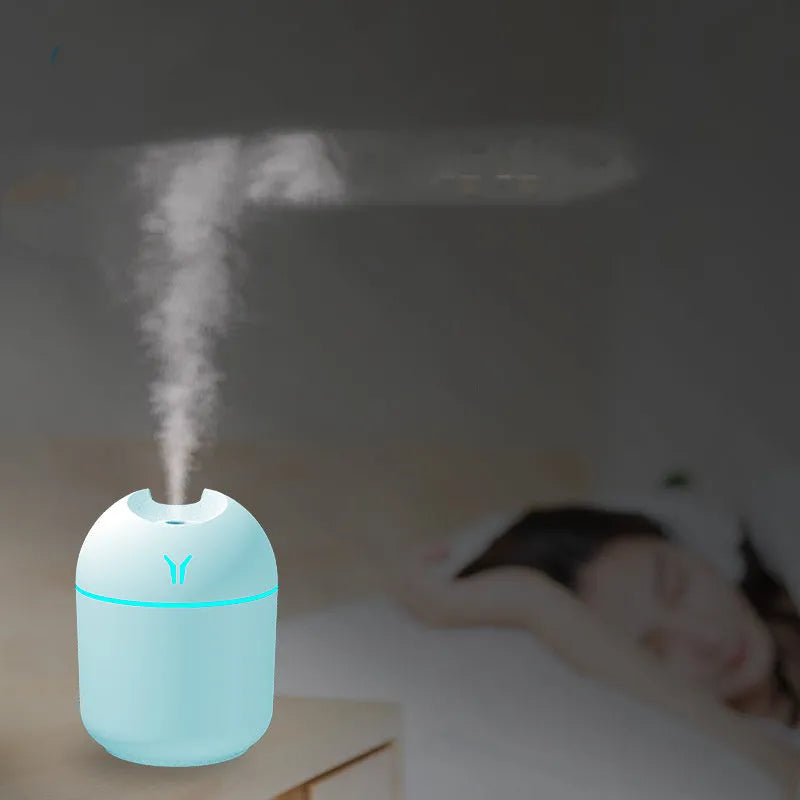 Home mini aromatherapy atomizer in ivory white, compact USB humidifier for desktop or car use