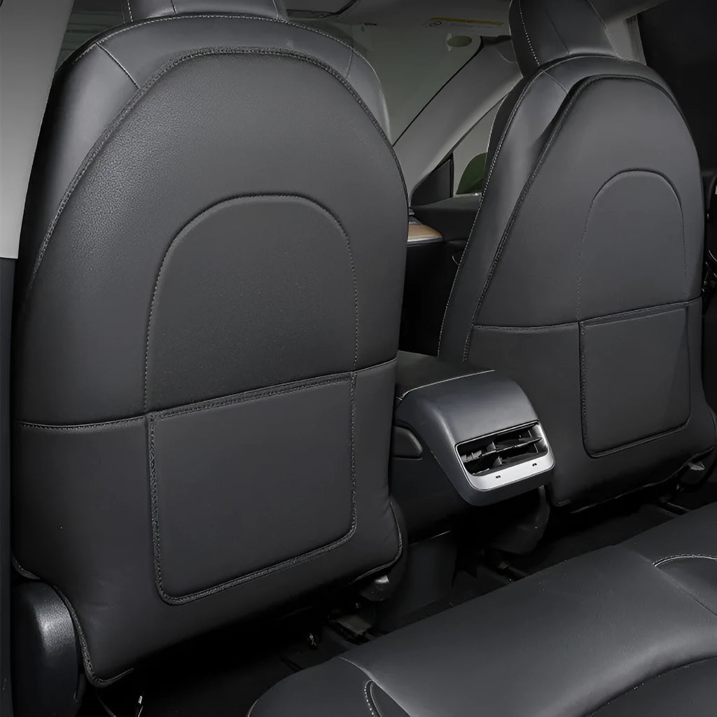 Black leather car seat kick pad measuring 68cm by 42cm, shown as a rear seat protector.
