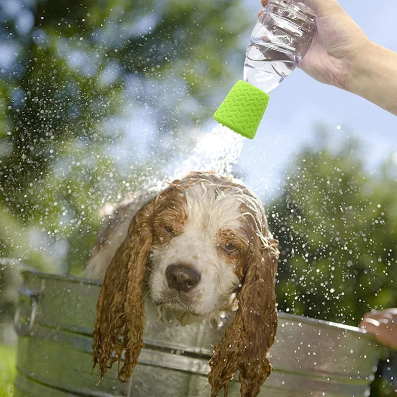 Silicone pet shower head in blue, green, and orange colours for portable dog and cat bathing