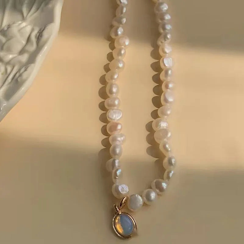 French Court vintage style pearl necklace with geometric pendant on an adjustable alloy chain.