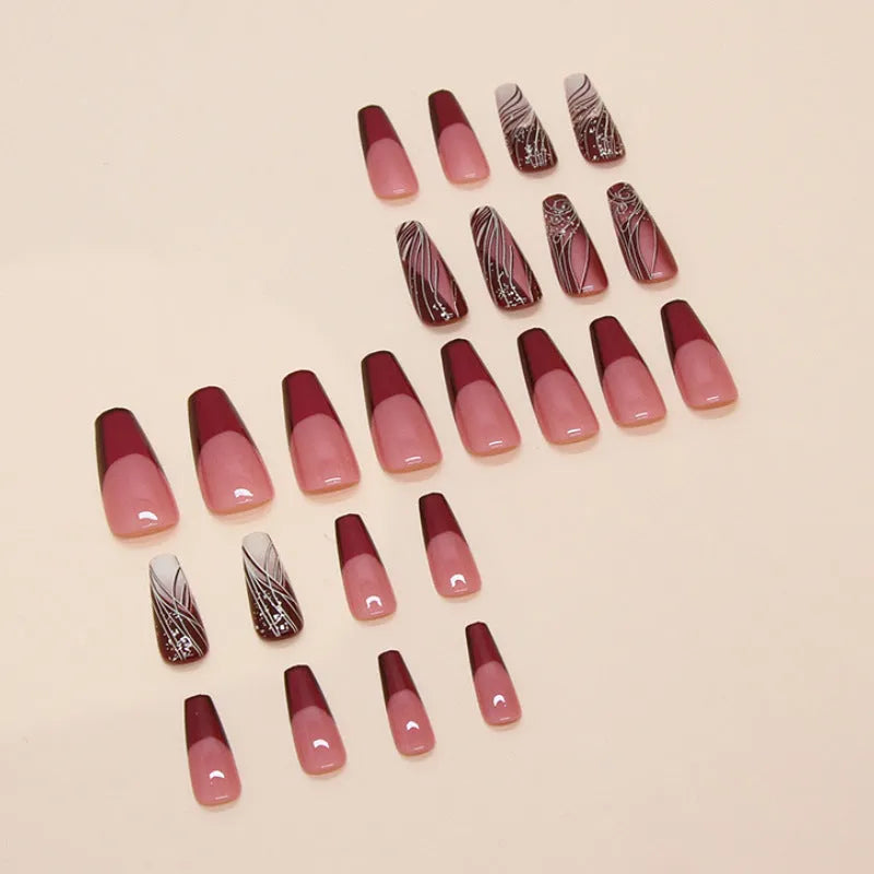 Line pattern fake nails in French line design W1620 with glue tube on white background