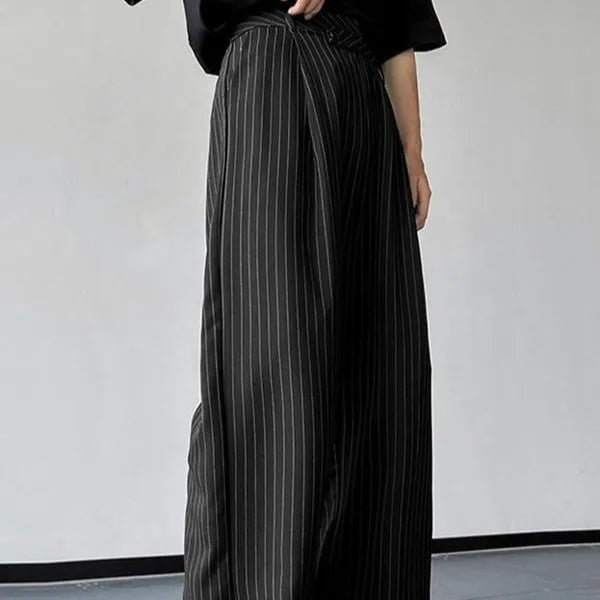 Black men's trousers with vertical stripes and pleated front design on elastic fabric