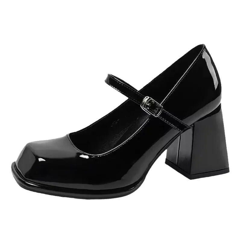 Women's retro black square toe chunky heel shoes with PU upper and buckle fastening on a white background