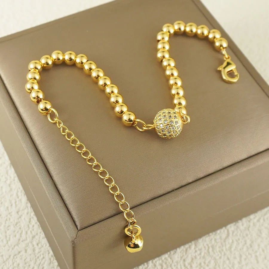 Women's copper bracelet with heart shape design and single zircon decorative element
