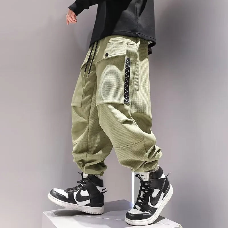 Plus-sized high waist drawstring big pocket teen trousers in black and green, size M to XXXL