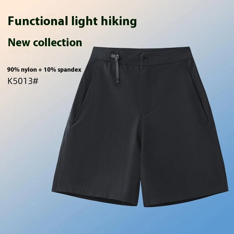 Men's quick-drying sports shorts in khaki colour with elastic waistband.