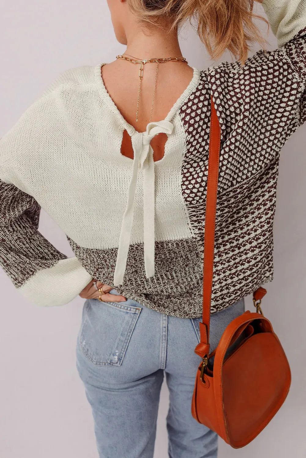 Dark khaki loose fit sweater with drop shoulders and a colour block back tie detail.