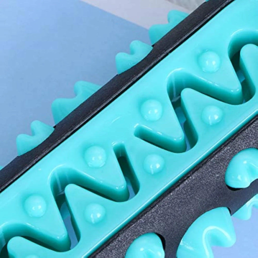 Natural rubber dog toothbrush chew toy for dental cleaning in blue, green, yellow, or black blue.