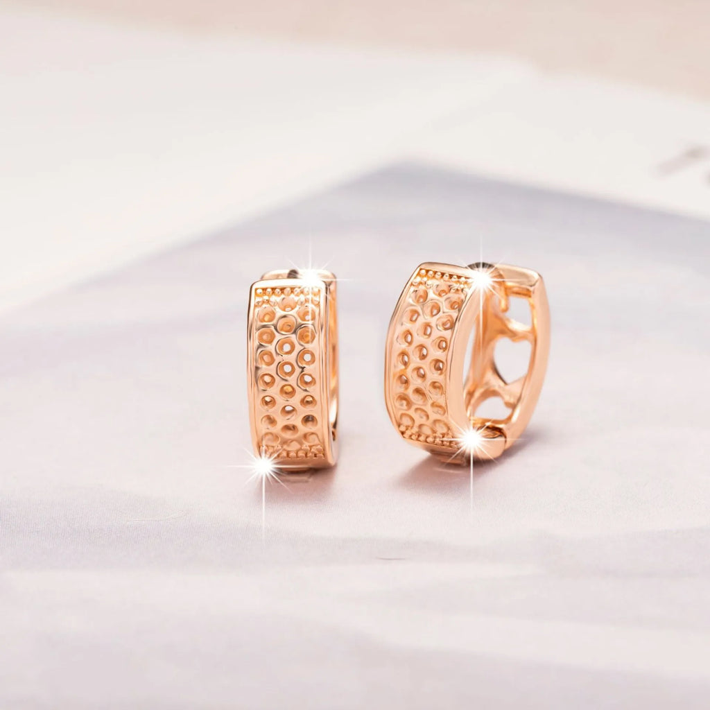 Rose gold hollowed-out heart-shaped women's earrings with circular silhouette