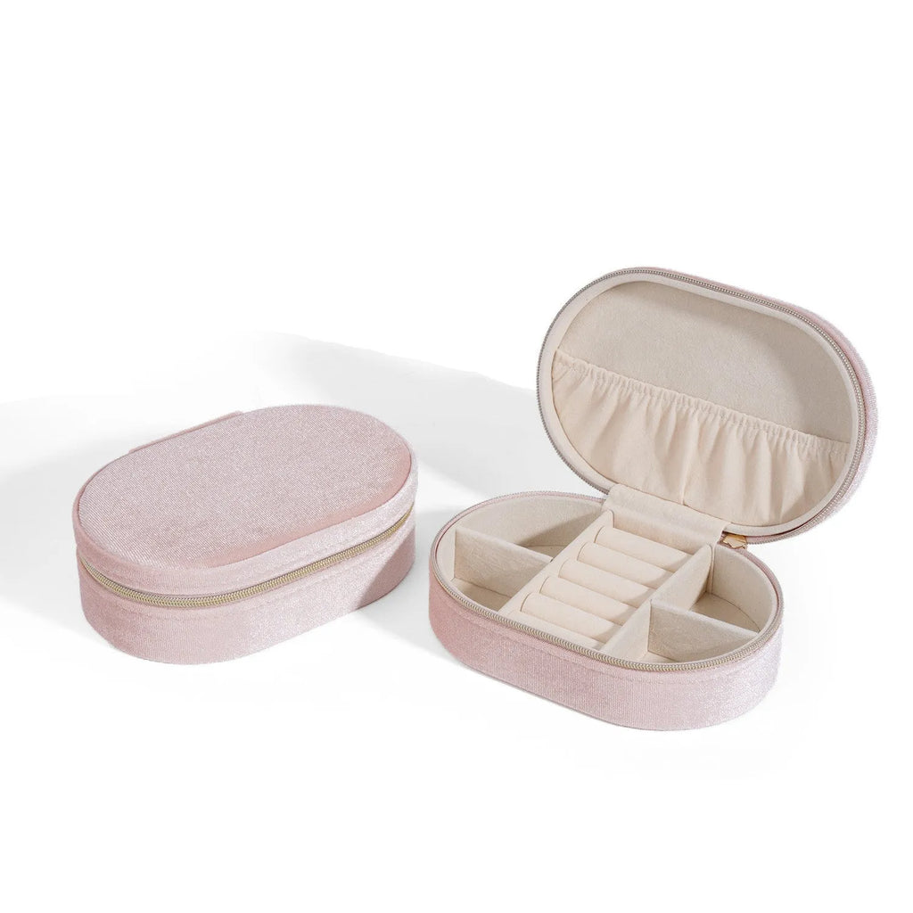 Oval-shaped velvet jewellery storage box with flannel lining, shown in lake blue colour.