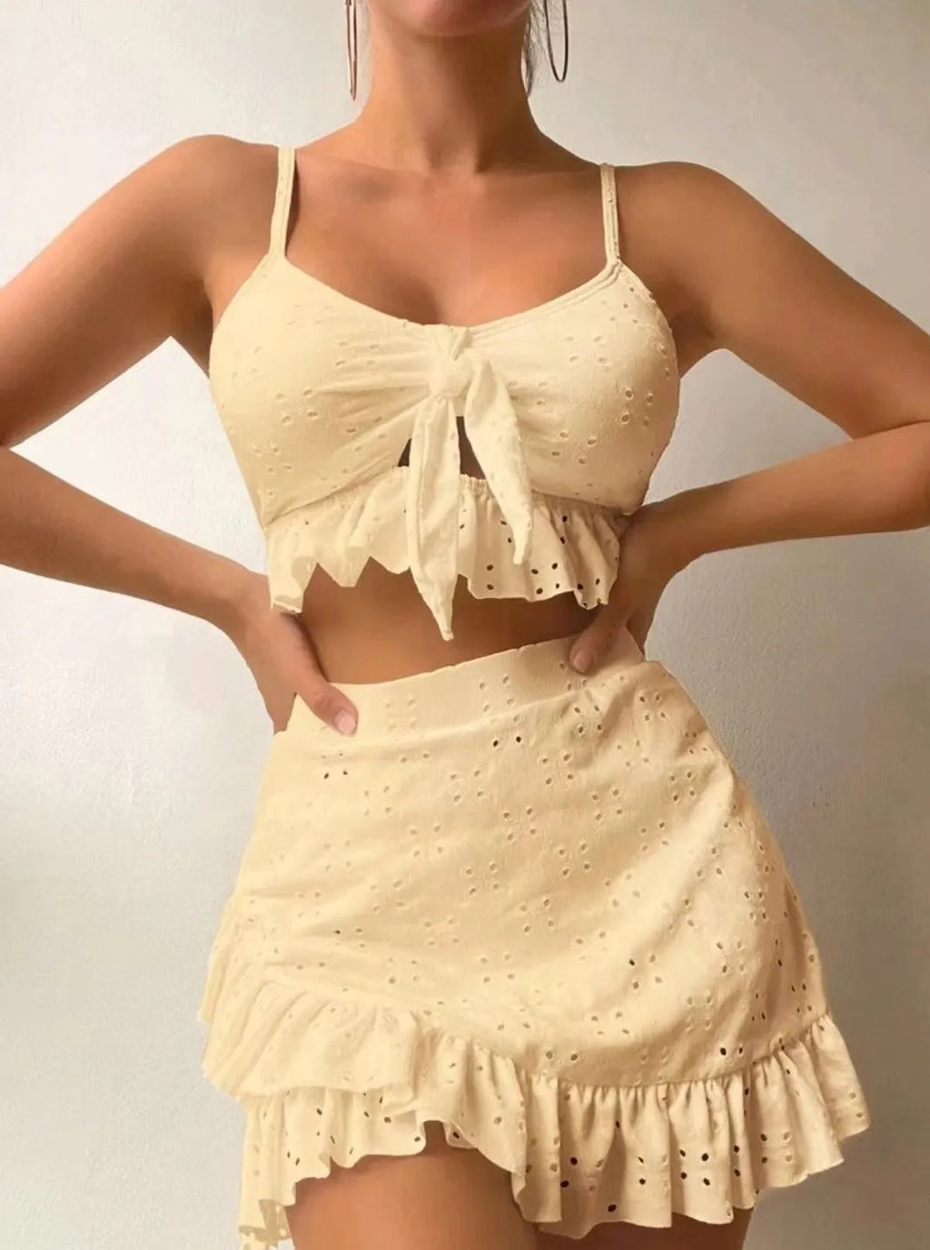 Women's split hip skirt three-piece bikini set in solid colour polyester, available in multiple shades including black and white