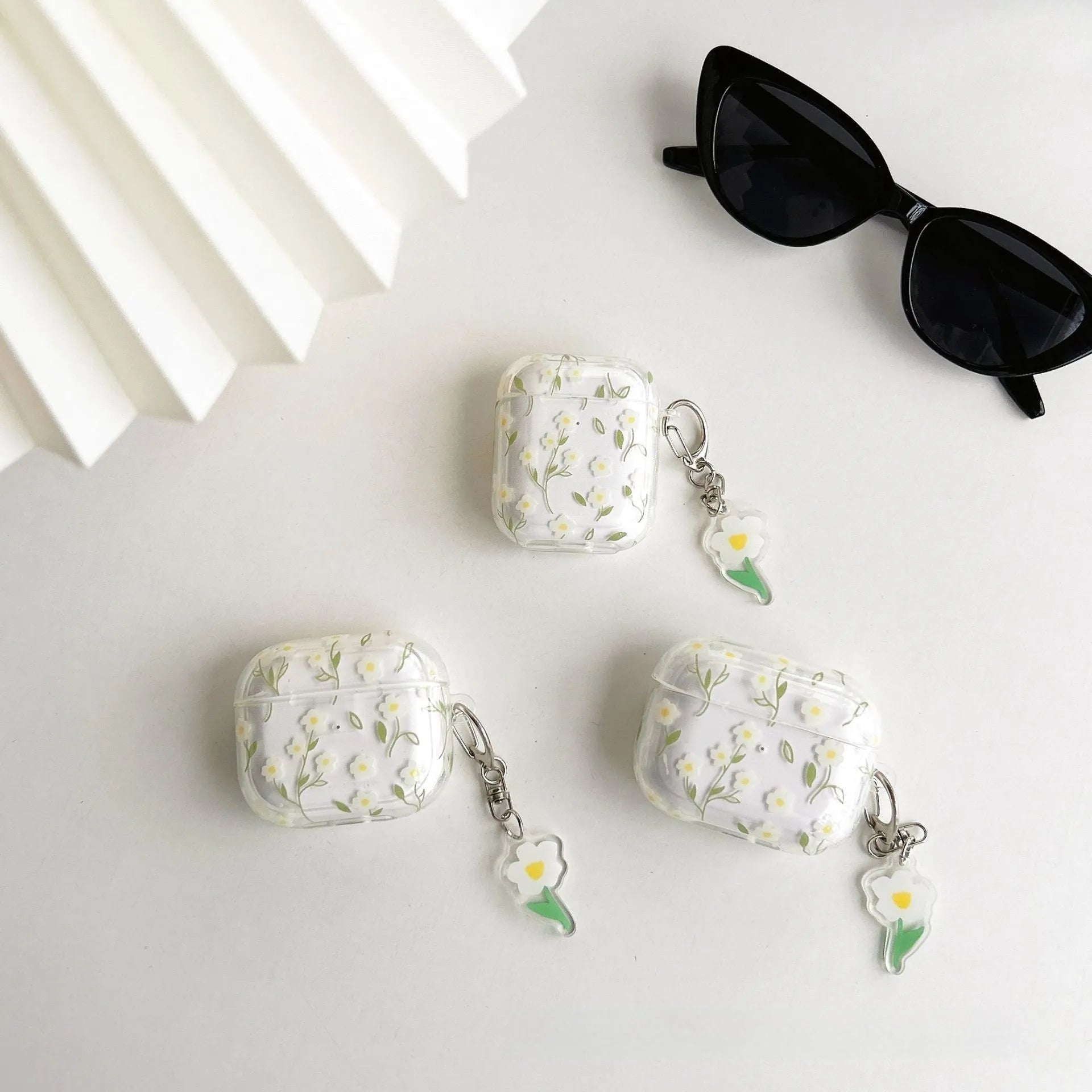 White floral pattern on clear TPU protective case for Apple AirPods