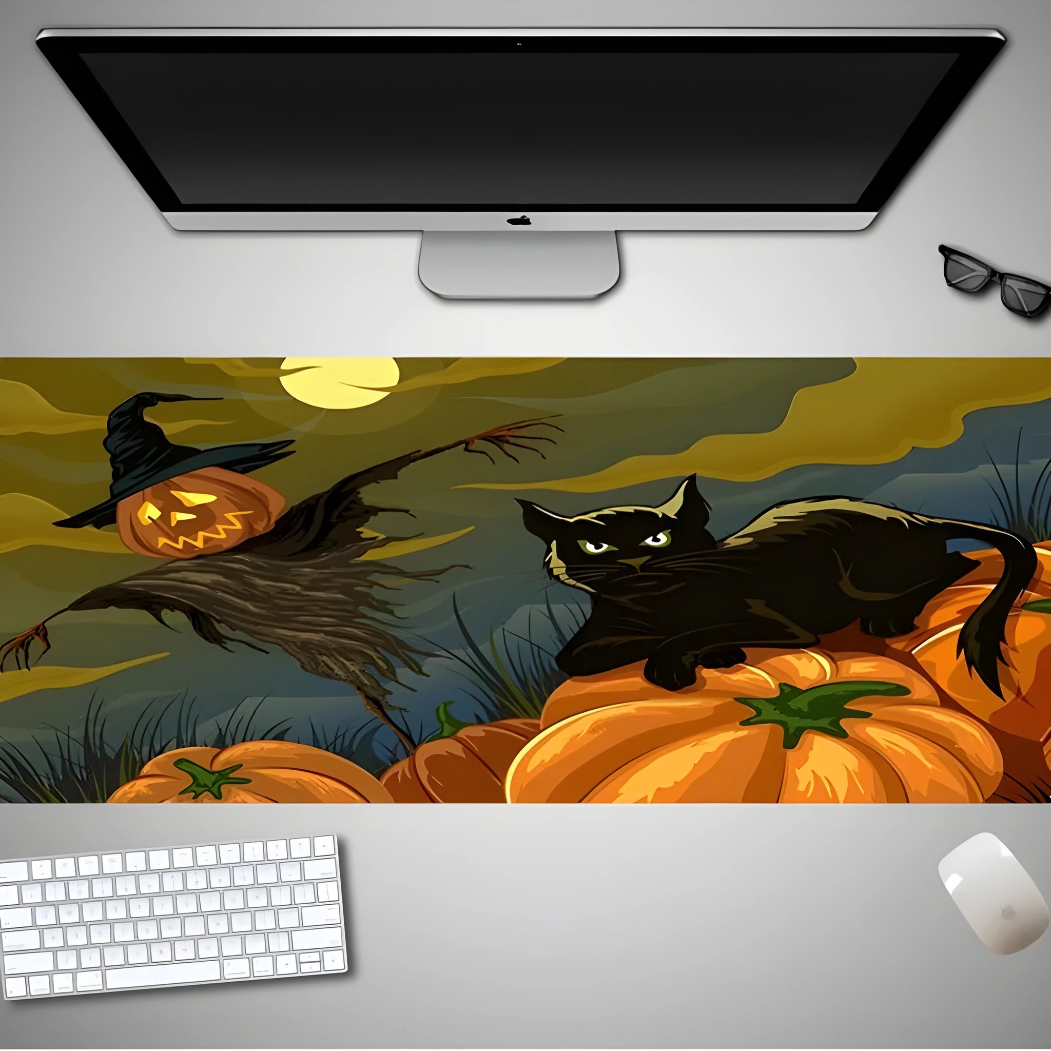Halloween-themed oversized mouse pad with non-slip rubber cloth backing on a desk