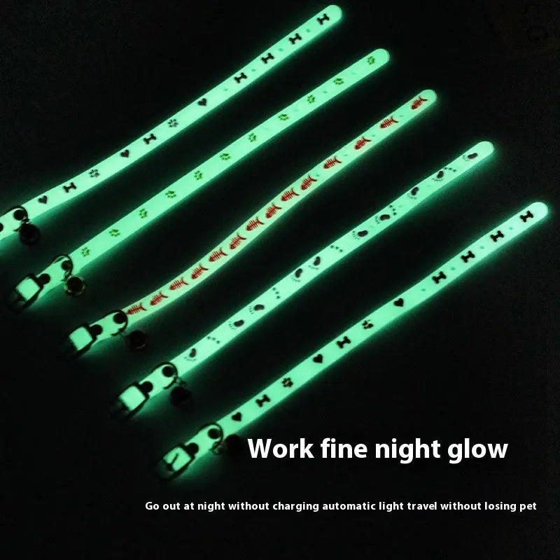 Meow Xinbao glow in the dark adjustable cat collar with metal bell on a silicone chain.