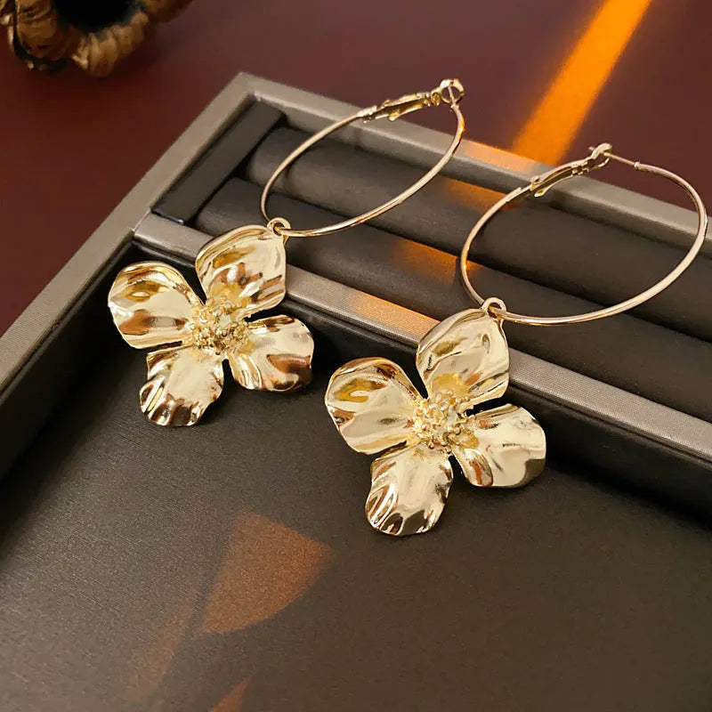 Silver needle drop metal flower earrings with geometric vintage design in gold and silver electroplated finishes