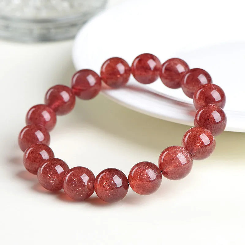 Natural strawberry quartz bracelet with geometric beads in starlight cherry red colour showing three bead size options