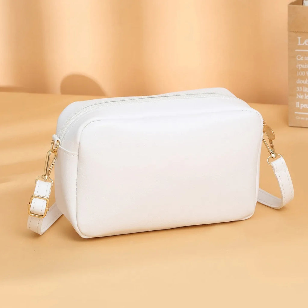 Women's solid colour PU shoulder bag with three-dimensional pocket in five colour options