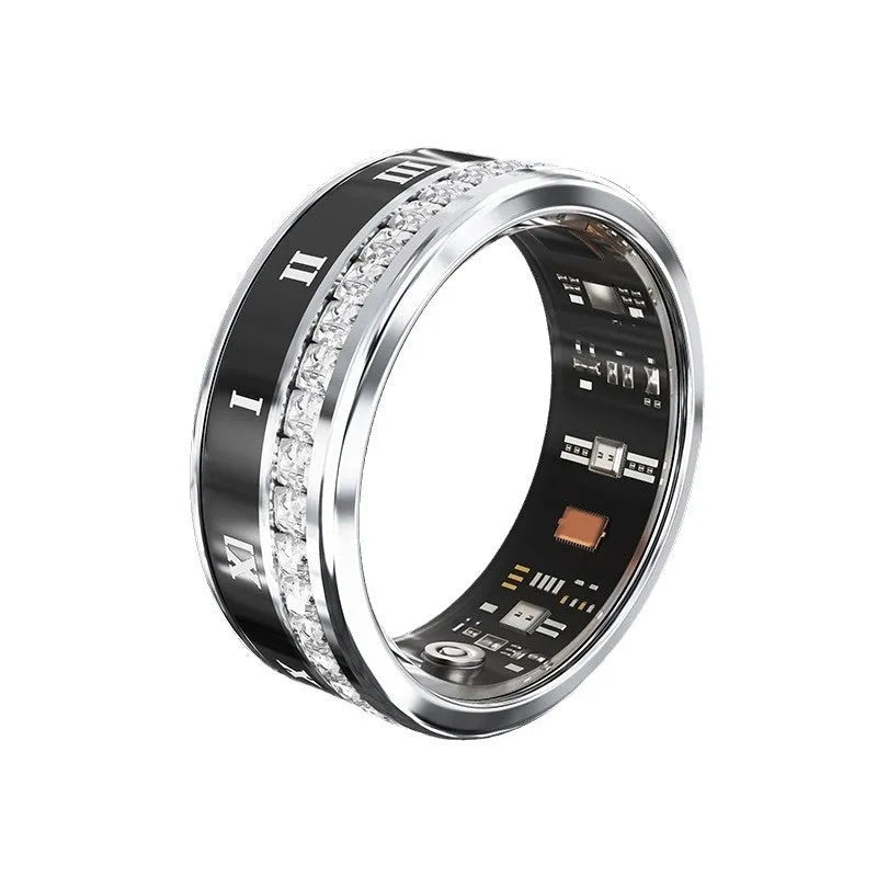 Gold and silver smart ring with diamond inlay on a finger, showing charging cable and box