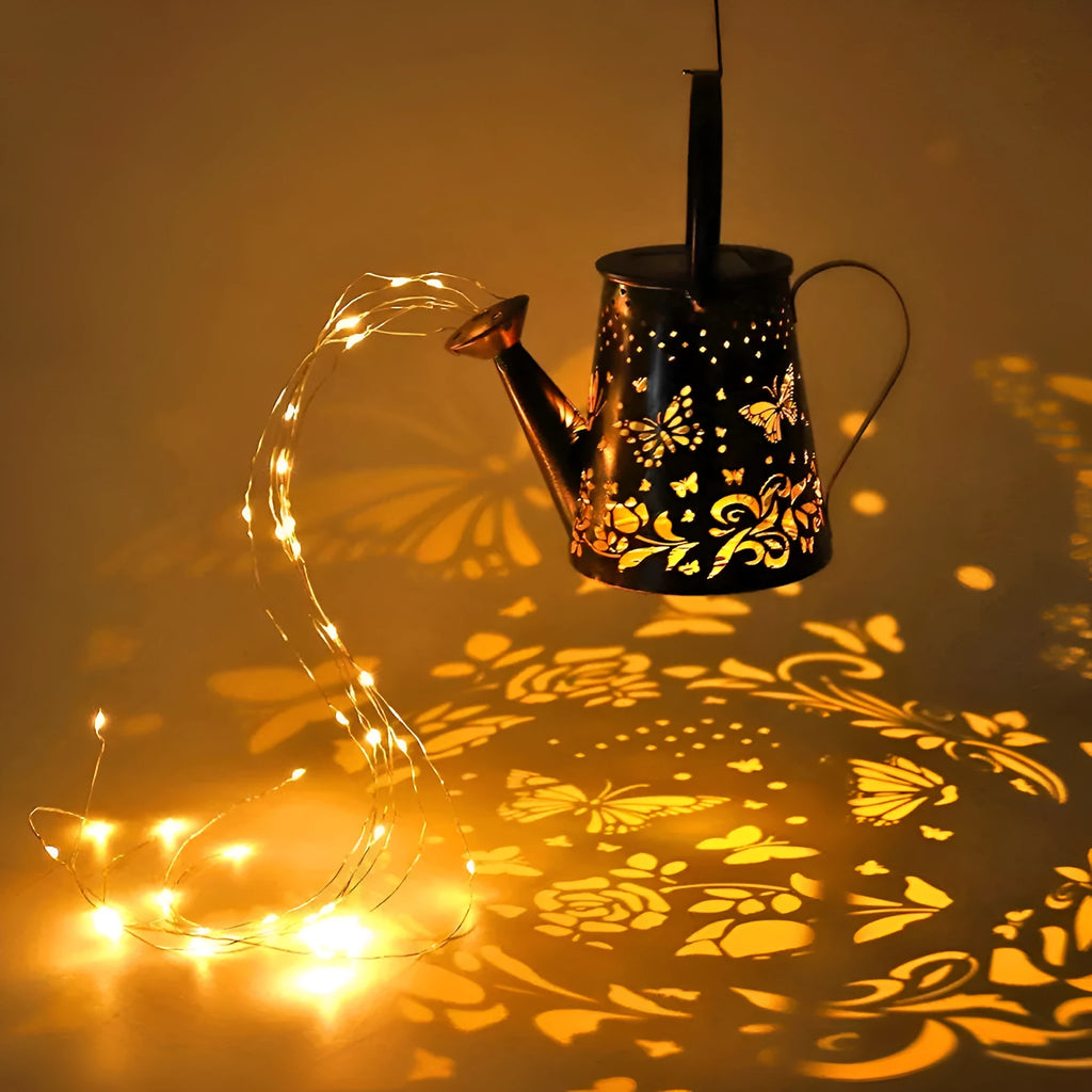 Tapered butterfly pattern solar garden lamp with iron construction and warm white finish