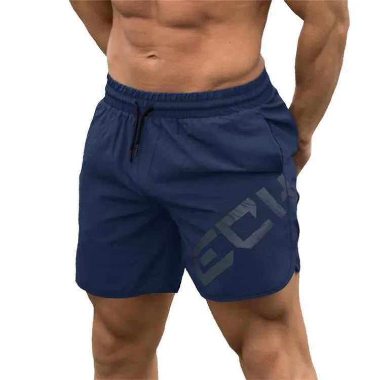 Man wearing black quick-dry nylon sports shorts with an elastic waistband, suitable for running and summer training.