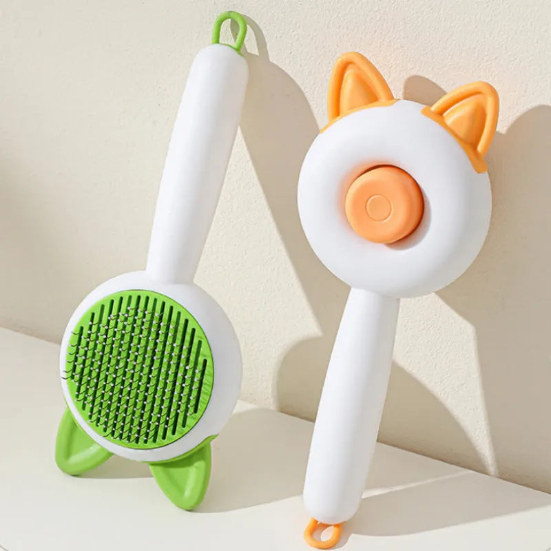 Self-cleaning pet grooming comb with stainless steel teeth in greenish white and orange white colour options