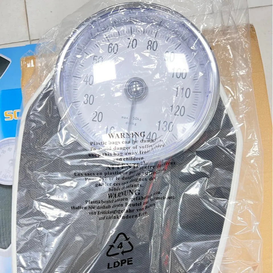 Black mechanical bathroom weighing scale with large dial on 47x35 cm platform