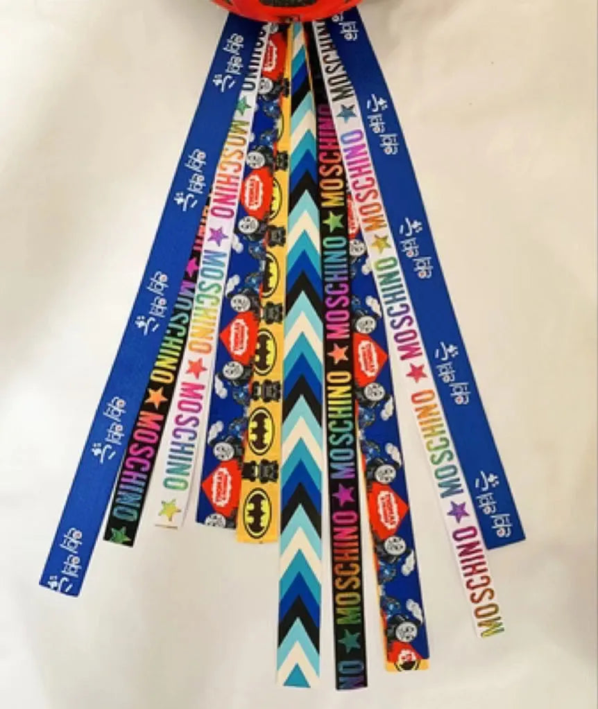 Children's helmet decoration streamers in twelve colour options including apricot, khaki and lotus root
