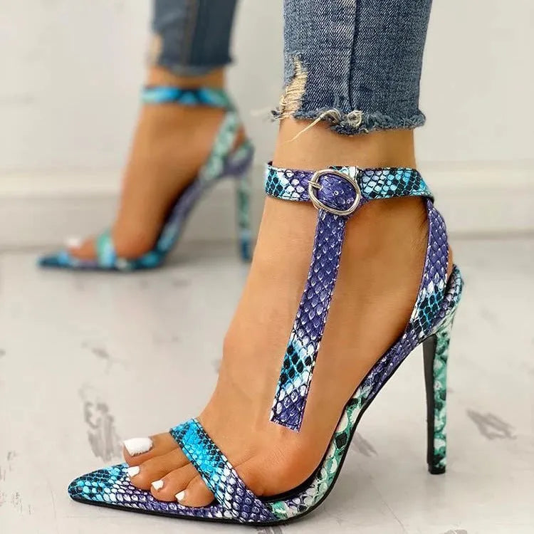 Blue women's high heels with hollow out design and a buckle strap, shown in a larger size.