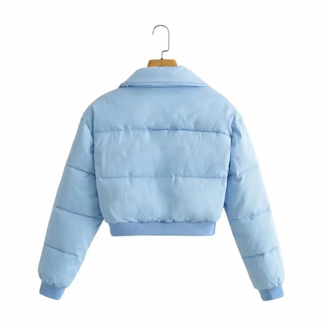 Women's loose polyester jacket in beige, black, blue or milky white colours with regular long sleeves