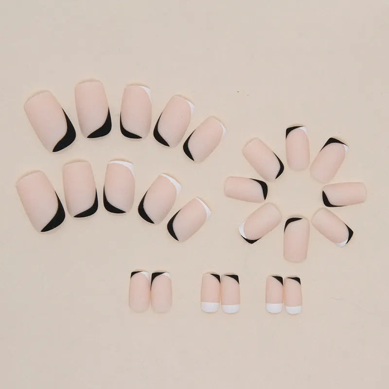 Black and white frosted false nails with French manicure style and Mandarin duck colour design