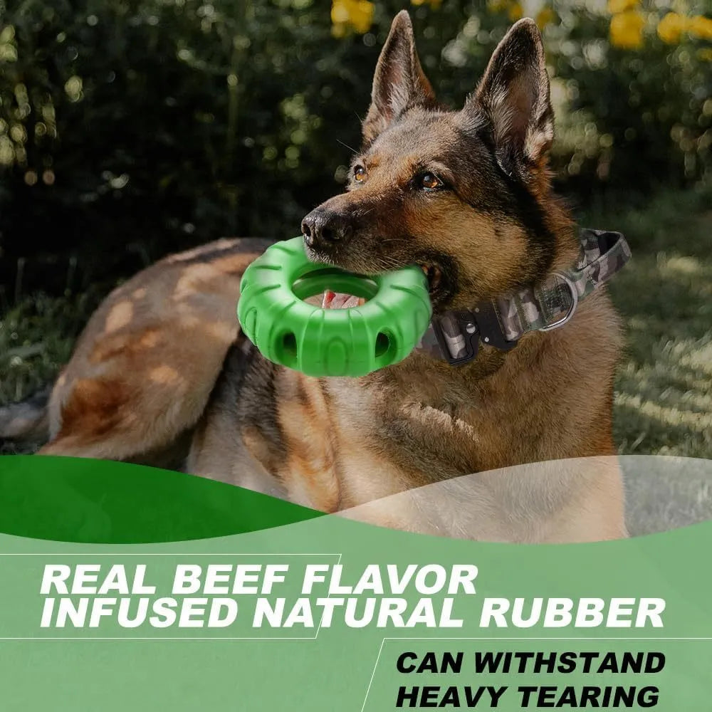 Blue durable natural rubber dog chew toy shaped like a tyre with oval openings.