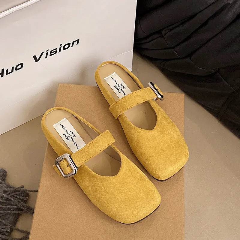 Women's flat closed toe slippers with square head in apricot, blue, red, or yellow colours on a rubber sole.