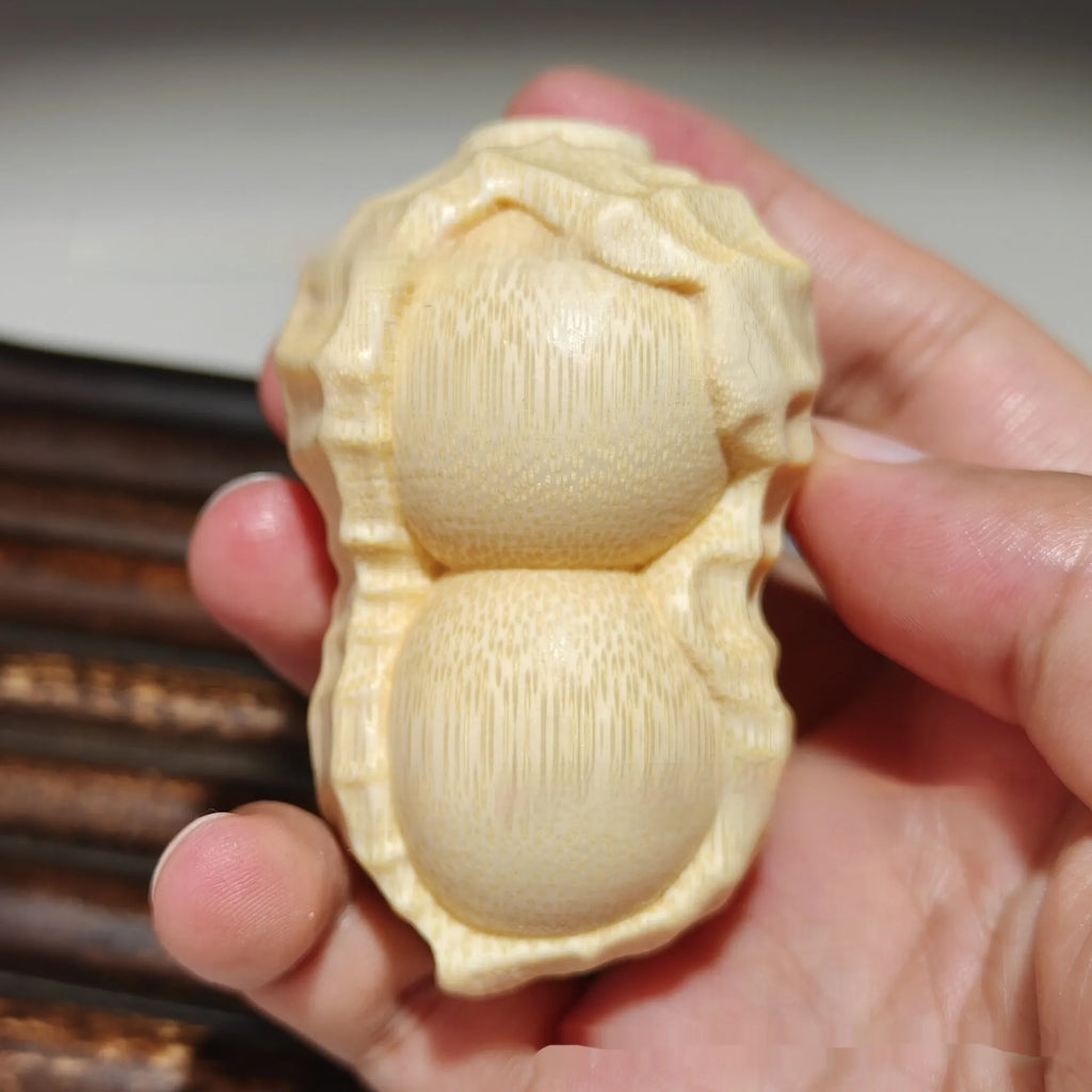 Natural solid bamboo carving peanut ornament with modern simplicity design for gift giving