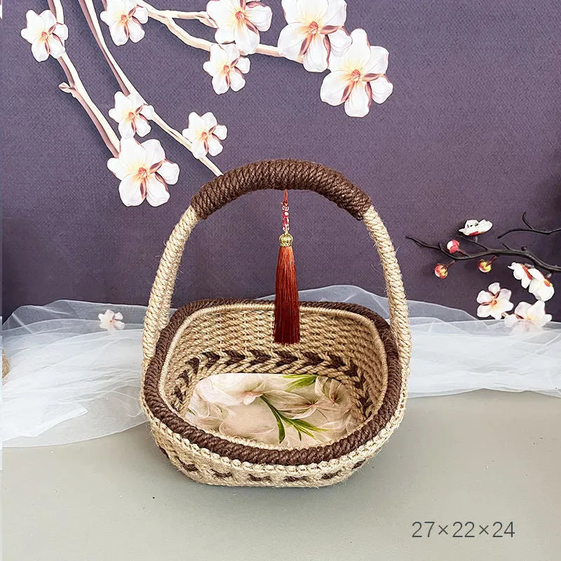 Hand-woven rustic straw basket in coffee brown colour, measuring 19cm by 12cm.